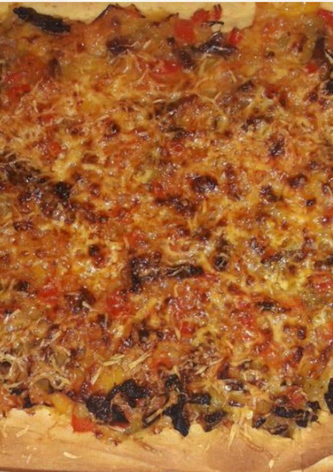 Una foto de Pizza vegetal algo original