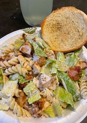 A picture of Chicken Caesar pasta salad.