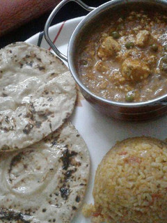 A picture of Matar paneer with chatpata rice and chapati.