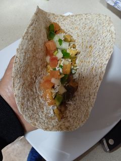 Una foto de Tacos mejicanos con pico de gallo