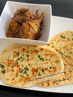A picture of Naan Bread & Hunglay Curry.