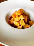 Choco guisado con papas fritas