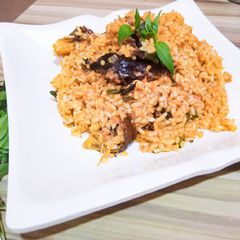 A picture of Palm oil rice native jollof rice.
