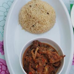 A picture of Afghan rice&lamb in ketchup&mayo.