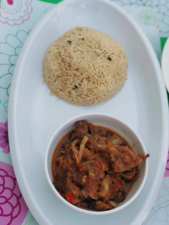 A picture of Afghan rice&lamb in ketchup&mayo.