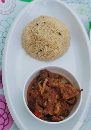 A picture of Afghan rice&lamb in ketchup&mayo.