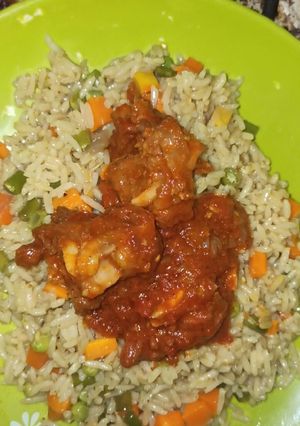 A picture of Fried rice and pepper meat sauce.