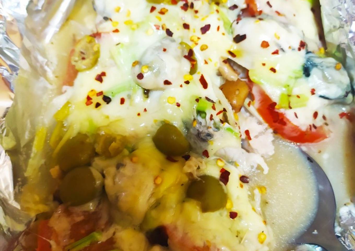 Pescado empapelado con ostiones