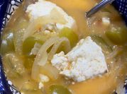 Una foto de queso panela guisado