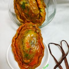 A picture of Tri colour drifruit stuffed kajjikaya.