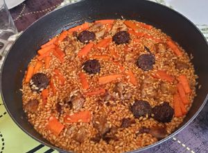 Una foto de Arroz de calabaza y morcilla granaína