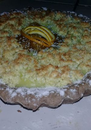 Una foto de Tarta de naranjas y masa base de harina integral y cacao🍊🍊🍫🍫