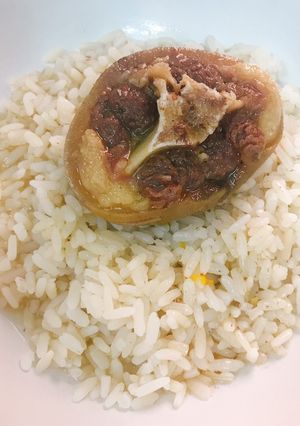 A picture of Coconut rice and boiled cowtail.