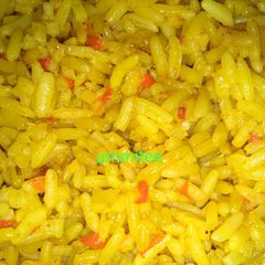 A picture of Curry jollof rice.