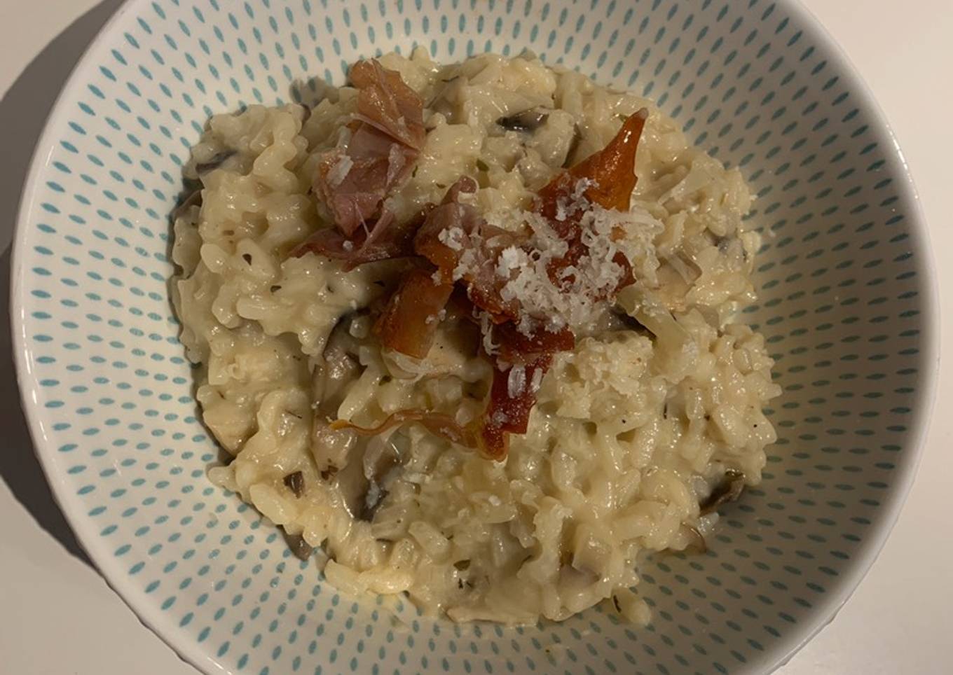 Mushroom risotto with crispy prosciutto