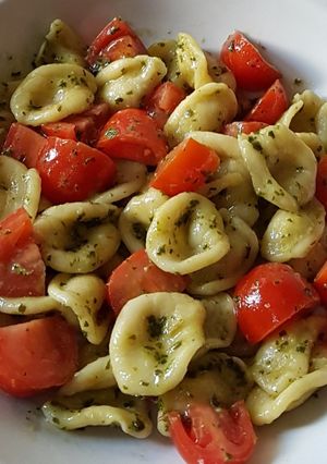 A picture of Orecchiette with Basil Pesto and Cherry Tomatoes.