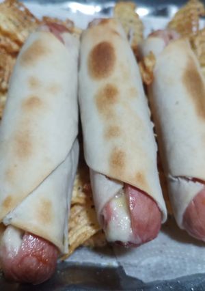 Una foto de Salchichas envueltas