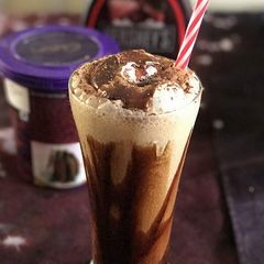 Coffee chocolate milk shake with vanila ice cream and choco syrup A picture of Coffee chocolate milk shake with vanila ice cream and choco syrup.