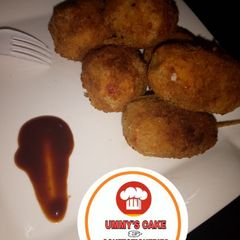 A picture of Meat stuffed S/potatoes.