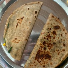 A picture of Spinach quesadilla with Thousand Island dressing!.