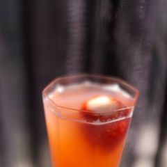A picture of Fresh strawberry and grapefruit vodka cocktail.