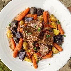 A picture of Braised Wagyu Roast with Carrots and Potatoes.