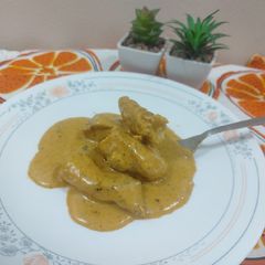A picture of Chicken with ranch dressing sauce.