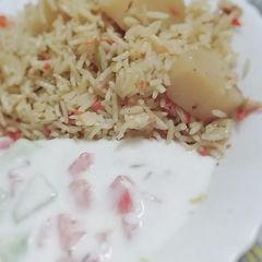 A picture of Alu valy chawal😋.