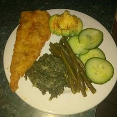 A picture of Fried fish and veggies.