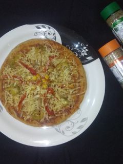 હોમમેડ પિઝા (without yeast)(home-made pizza recipe in gujarati) રેસીપી મુખ્ય ફોટો
