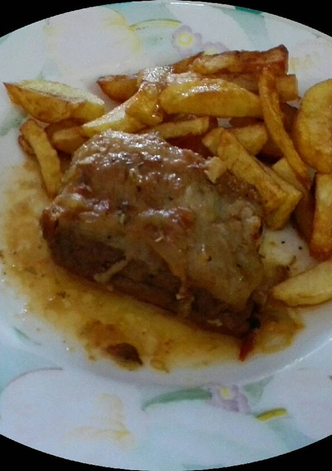 Una foto de Costilla ibérica en salsa