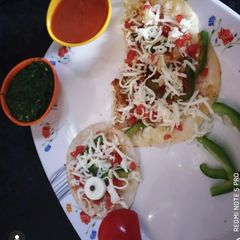 Paneer Uttapam A picture of Paneer Uttapam.