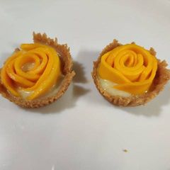 A picture of Mini Mango Custard Tart.