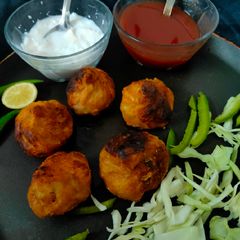 A picture of Tandoori veg Momos.