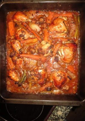 A picture of Baked Chicken thighs in potatoes.