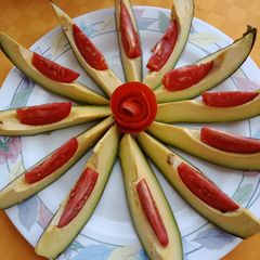 A picture of Tomato avocado salad.