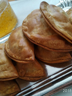 Foto principal de Empanadillas de pollo escabechado con cerveza