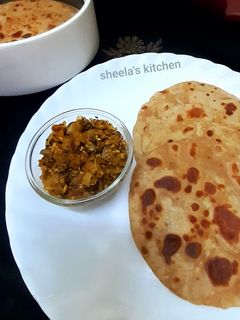 পরোটা আর আন্ডা ভূর্জি (potota r anda bhurji Recipe in Bengali) রেসিপির প্রধান ছবি
