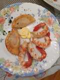 Langostinos y mini empanadillas de merluza