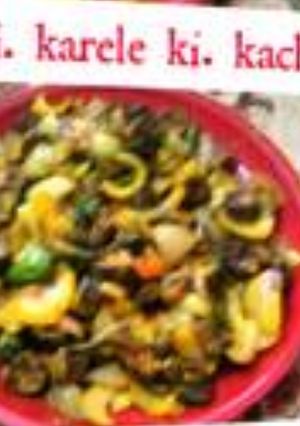 A picture of Bittergourd with raw mango.