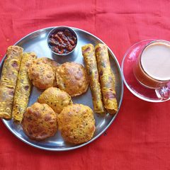 A picture of Thepla Puri Pickle and Masala Tea.