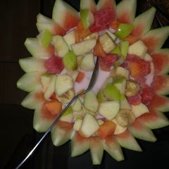 A picture of Fruit salad with milk.
