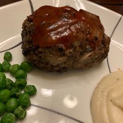 A picture of 1/2 meat Meatloaf.