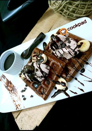 A picture of Chocolate waffles with icecream.
