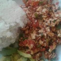 A picture of Fried Eggs with Ugali.