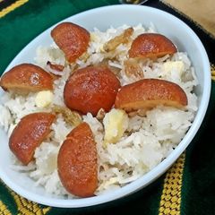 Zarda with baby gulab jamuns A picture of Zarda with baby gulab jamuns.