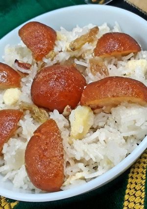 A picture of Zarda with baby gulab jamuns.