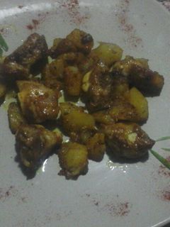 Una foto de Costillas adobadas con patatas
