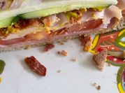 A picture of thinly sliced deli ham