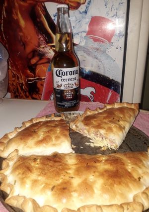 Una foto de Calzonne de jamón y queso